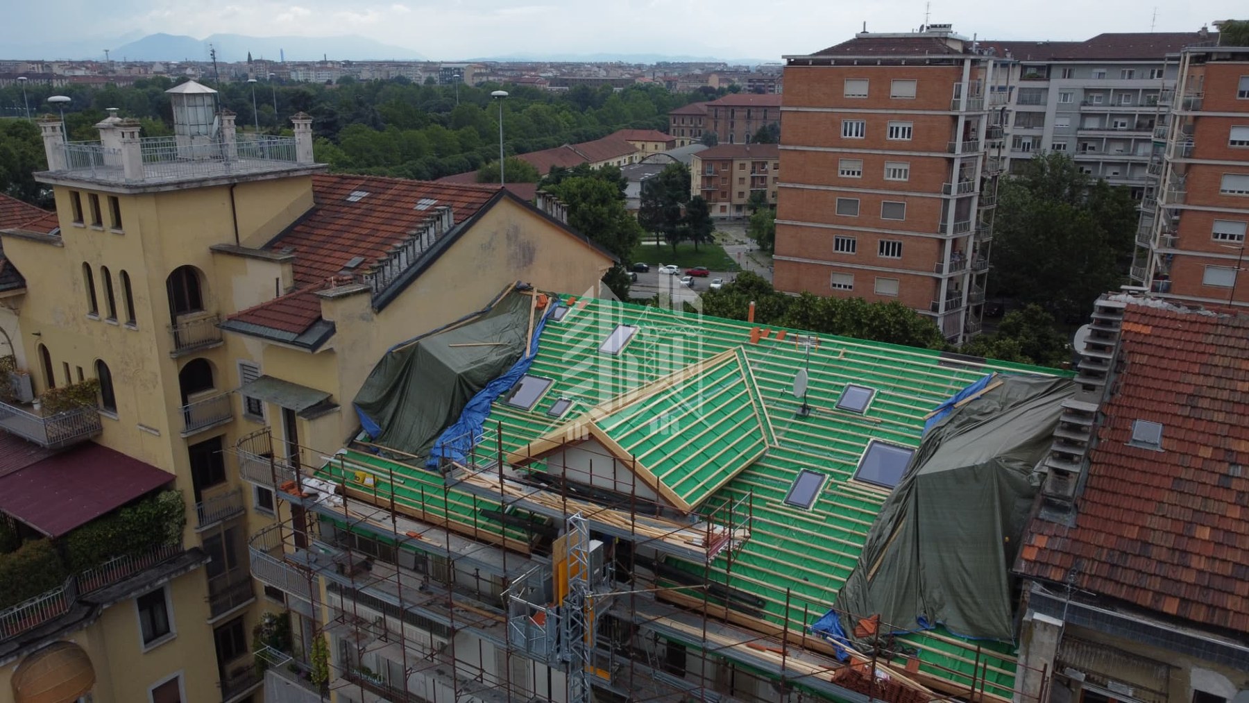 Corso Re Umberto — Orditura completata con nuovi abbaini e lucernari